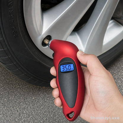 Backlit digital tire gauge showing PSI reading in dark garage